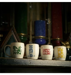 Warner Bros Slytherin Logo Mug -Warner Bros StyleGuideMugs Gryff6 23c03d19 ca1b 4d00 9480 a17eb4b707ef